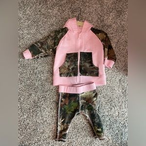 Baby girl camo sweat suit.